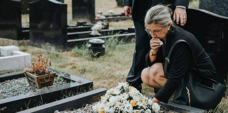 Why You Never Stop Grieving When You Lose Someone You Love woman laying flowers on grave