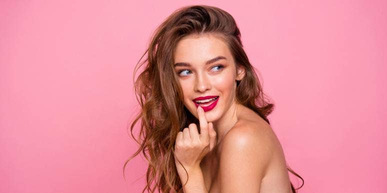 3 Major Reasons You're Still Single (And How To Change That) flirty woman