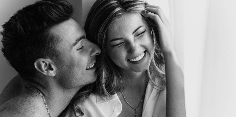 woman and man laughing