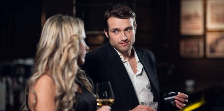 Why Guys Don’t Jump Into Relationships Quickly man and woman at bar