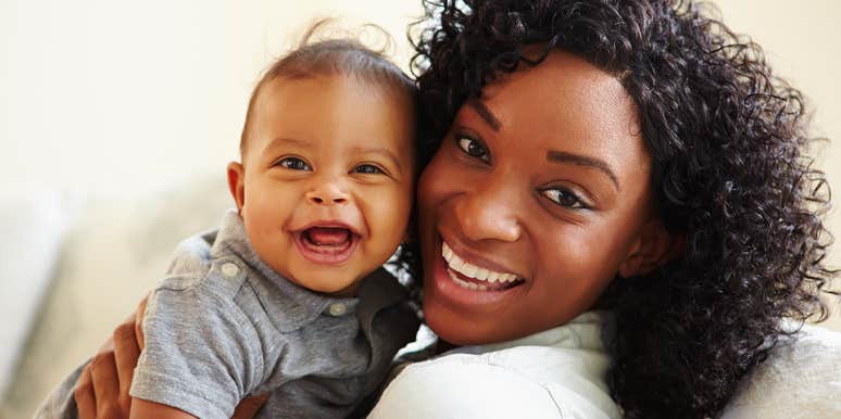 Why Having A Second Baby Is A Shockingly Huge Deal To Me mother holding baby