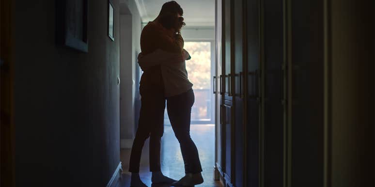 Why I'll Only Date Someone Who's In Therapy man and woman hugging in hallway