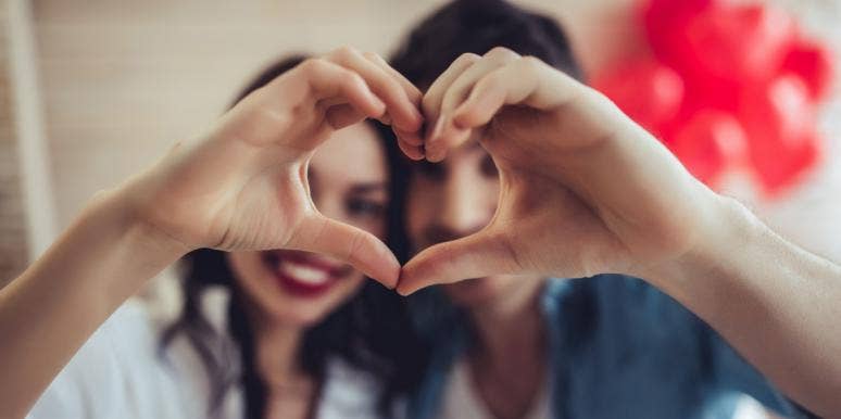 7 Reasons Left-Handed People Are The Best People To Love couple holding up left and right hands