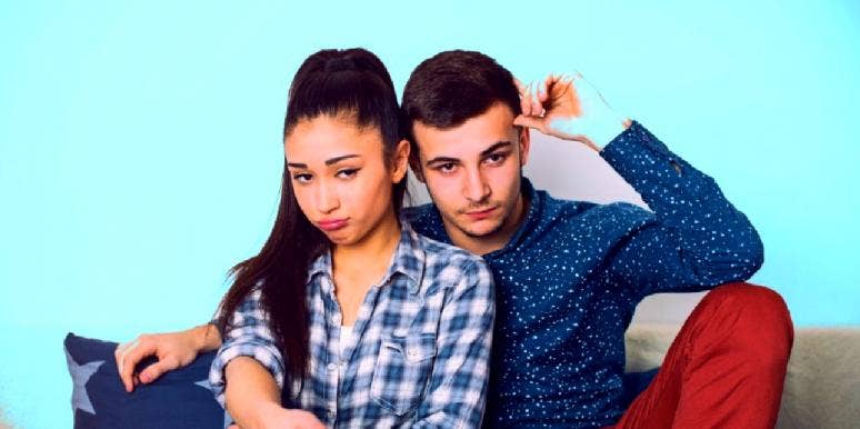 Why Male Zodiac Signs Act Distant, Pull Away And Ignore You woman next to man who's acting distant and pulling away