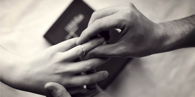 Why Marriage Matters man putting ring on wife's finger