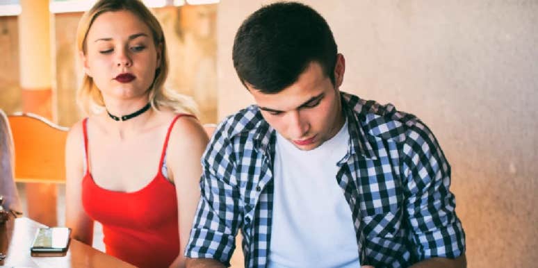 Why Men Pull Away And How To Make it Stop woman sitting next to man who is pulling away