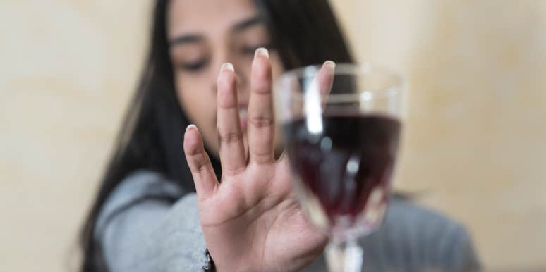 PSA: Please Stop Asking Me Why I'm Not Drinking woman refusing a drink