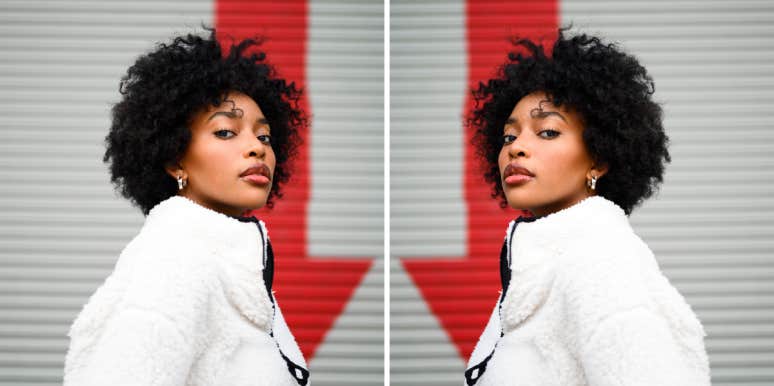 Women With This Personality Trait Have Much Better Marriages woman in front of down facing arrow duplicated