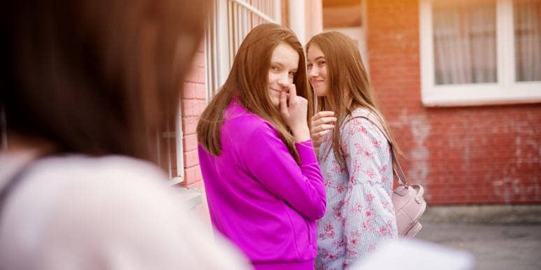 Why Rudeness Is Just A Weak Person Pretending To Be Strong woman in pink smirking