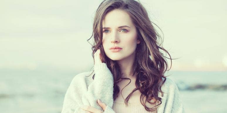 Why Saturn In Astrology Isn’t Always The Malefic ‘Bad Guy’ woman contemplating saturn astrology