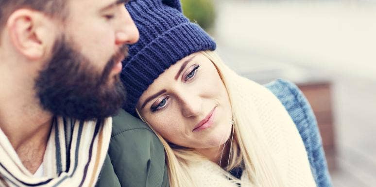 why some couples survive infidelity woman leaning her head on man's shoulder