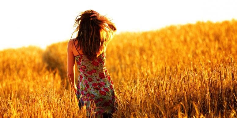 Why Walking Out Can Be The Best Decision You Ever Make woman walking in field