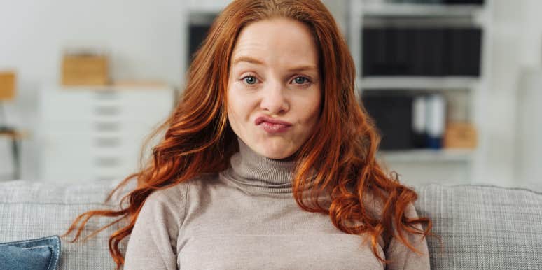 The 11 Real Reasons Women Break Up With Men woman with unimpressed and annoyed facial expression