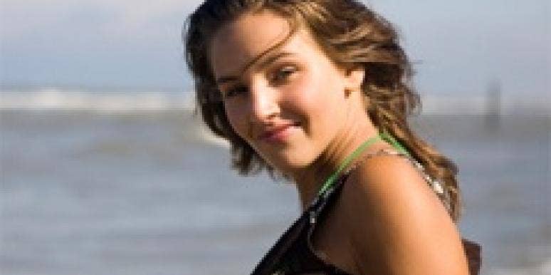 5 Steps To The Sexy Hairstyle Men Love Most woman on beach