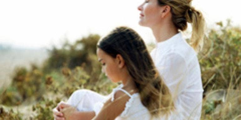 How To Be A Mother, A Wife—And Yourself mother and daughter sitting at the beach