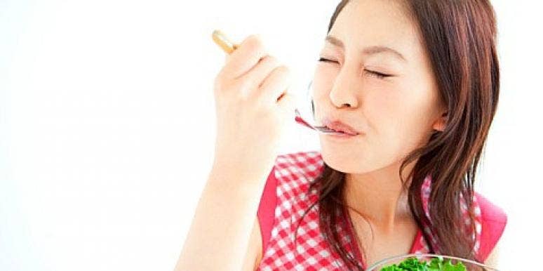 woman eating salad woman eating salad
