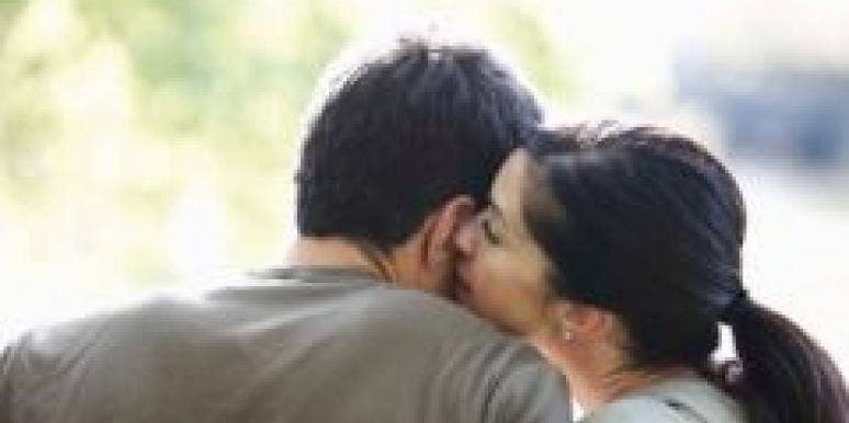 One Woman's First-Year Relationship Revelations couple cuddling