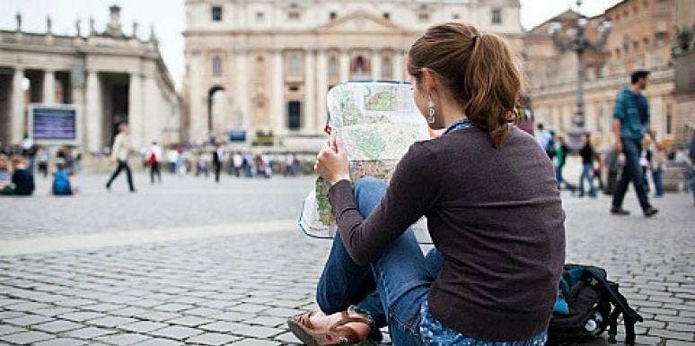 woman looking at a map woman looking at a map