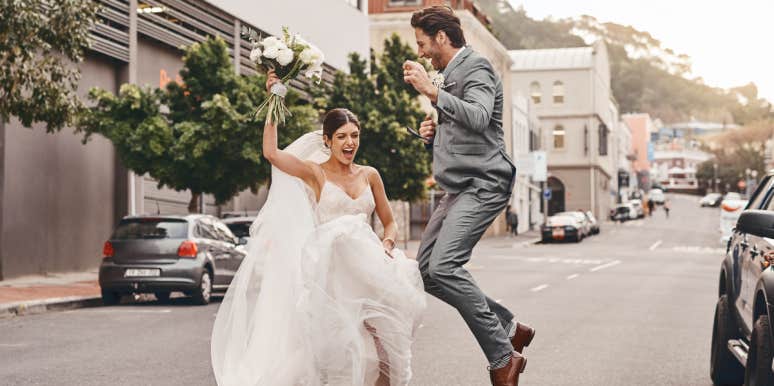 Woman Shares The Sad Truth Behind Her Wedding To Her Best Friend Bride and groom jumping in the street