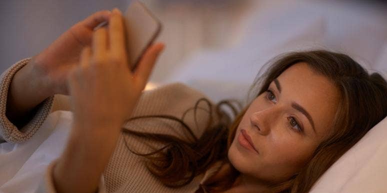 Woman Wonders If She Is Wrong For Screenshotting 'Gross' Messages Guys Sent Her & Sending Them To Their Mothers woman texting on phone while laying in bed