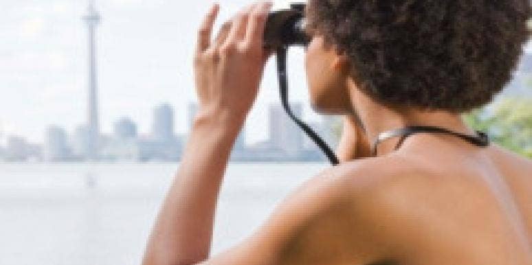 Is Your Desperation Driving Men Away? woman using binoculars