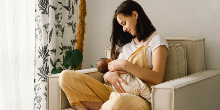 Woman nursing baby