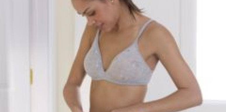 My Boyfriend Thinks I'm Fat Woman with a tape measure around her stomach