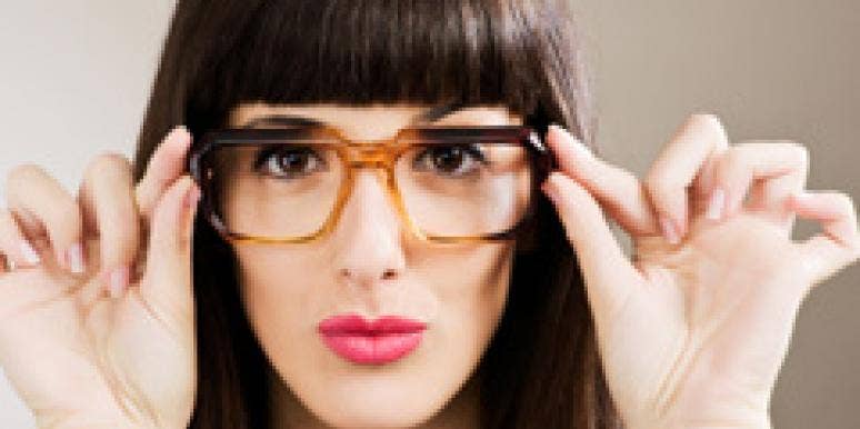 woman with thick glasses