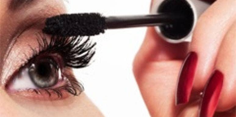 6 Ways To Look Like A Knockout On Date Night woman putting on mascara