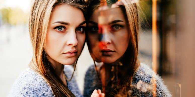 Women And Alcohol Use Disorders serious woman leans against a mirror