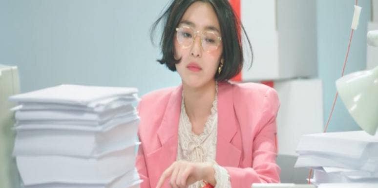 workaholic office woman at her desk