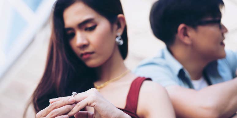 You Don't Need Anyone's Permission To Get Divorced woman taking off wedding ring