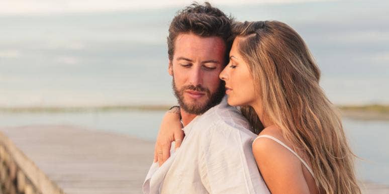 Why You're Wasting Your Time Believing In Fairytale Love woman cuddling man