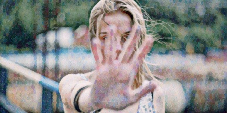 This Simple Test Is Proof Your Thoughts Become Your Reality woman with her hand up