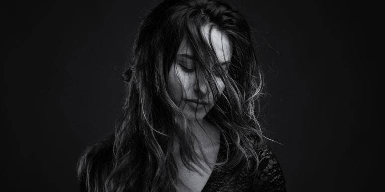 The #1 Sign You're Addicted To Intensity woman in the dark