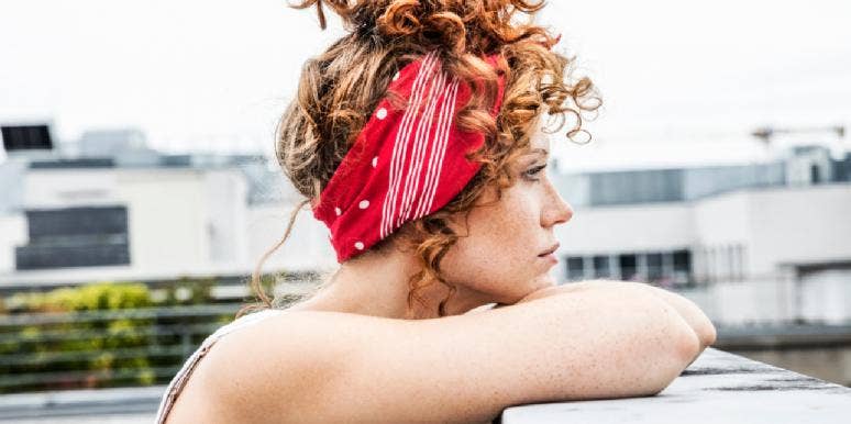 How Each Zodiac Sign Deals With Sadness, According To Astrology sad woman with headband