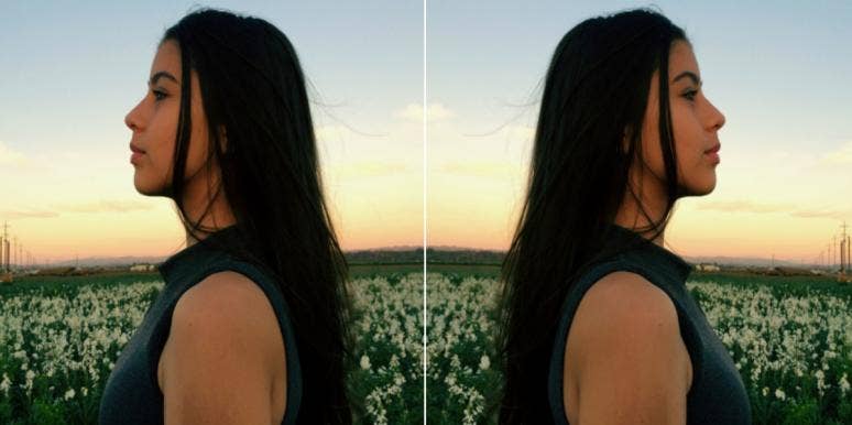 How Each Zodiac Sign Acts When Angry woman with long brown hair in a field of flowers