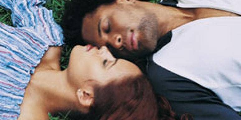 couple lying in the grass
