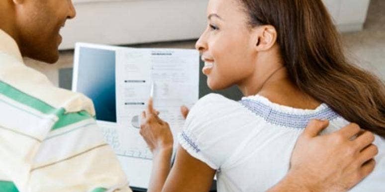 10 Tips For Talking Money With Your Spouse couple paying bills together