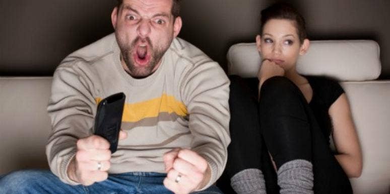man watching sports with girlfriend I'm A March Madness Widow