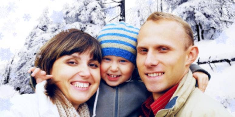 Scaling Back For The Holidays Helped Me Heal couple with child outside in the snow