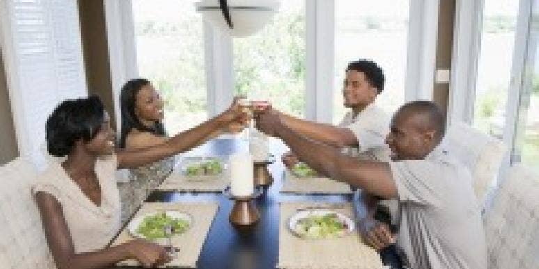 Two couples toasting
