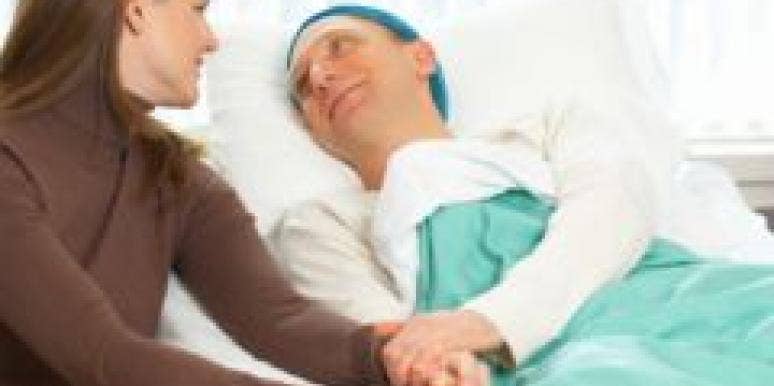 woman at man's bedside