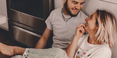 couple sitting on the floor together