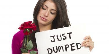 woman with flowers just dumped