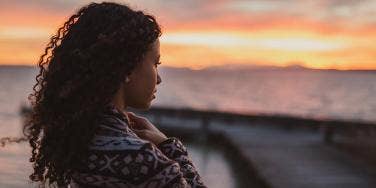 woman staring off into sunset