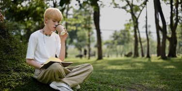 man reading book