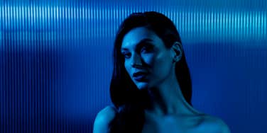 woman blue background