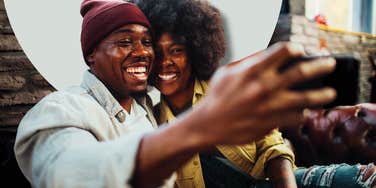 Couple on date night, taking a selfie, dressed up-- having fun