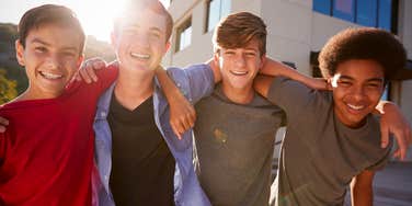 group of teen boys smiling